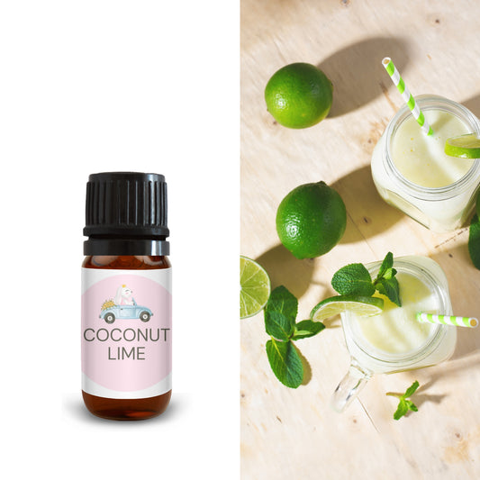 10ml coconut lime oil bottle next to fresh limes, mint, and smoothies on a wooden table