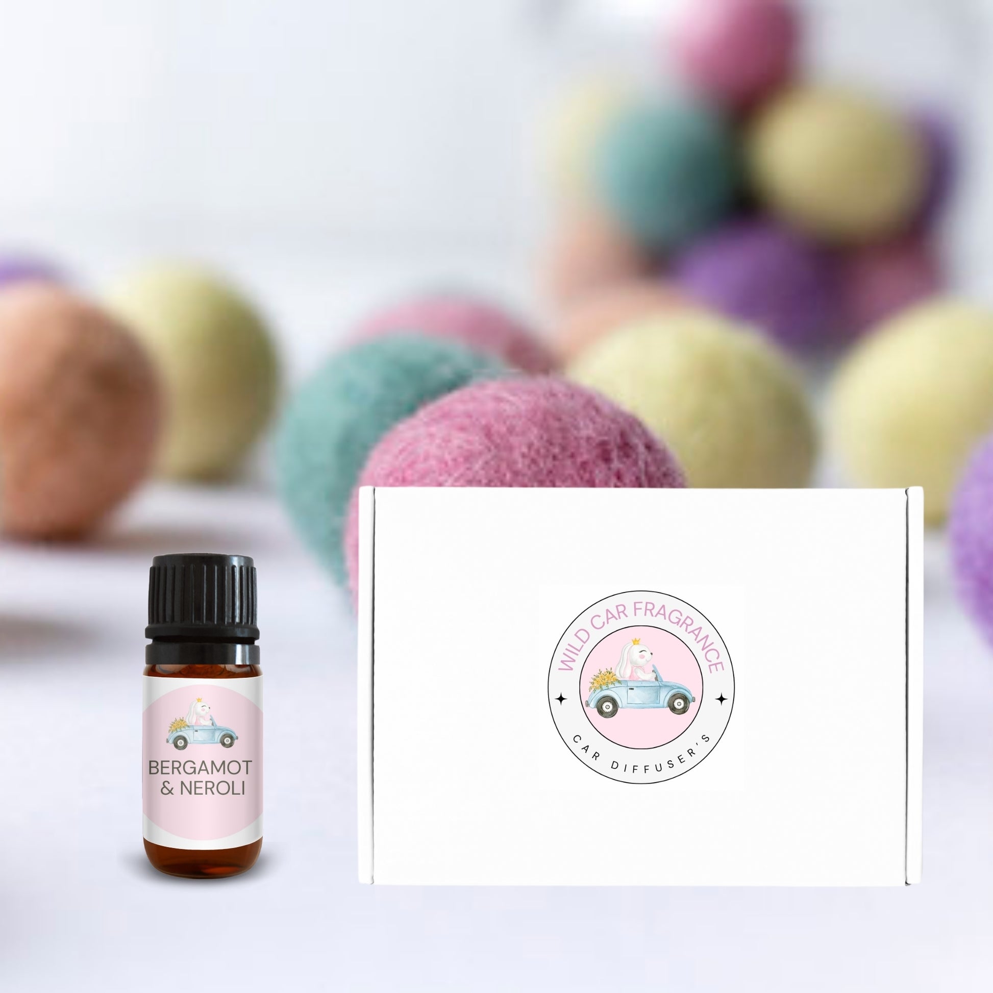 Small gift box next to 5ml fragrance oil for car diffuser
