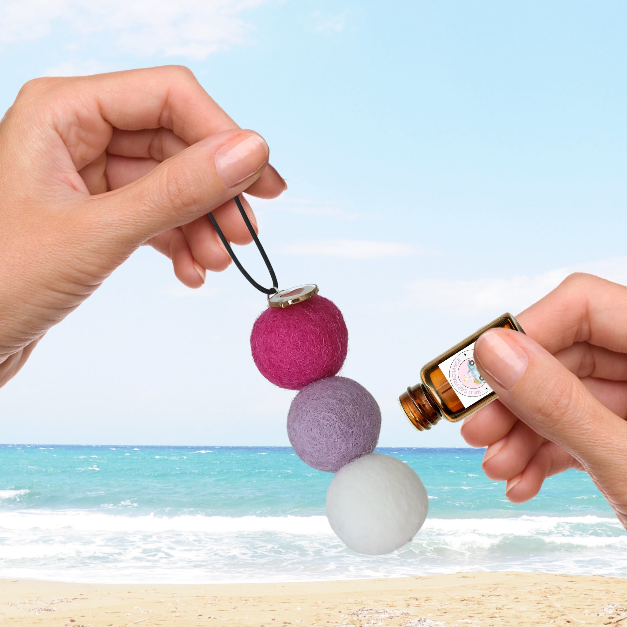 Reusable car fragrance felt balls with scent being added