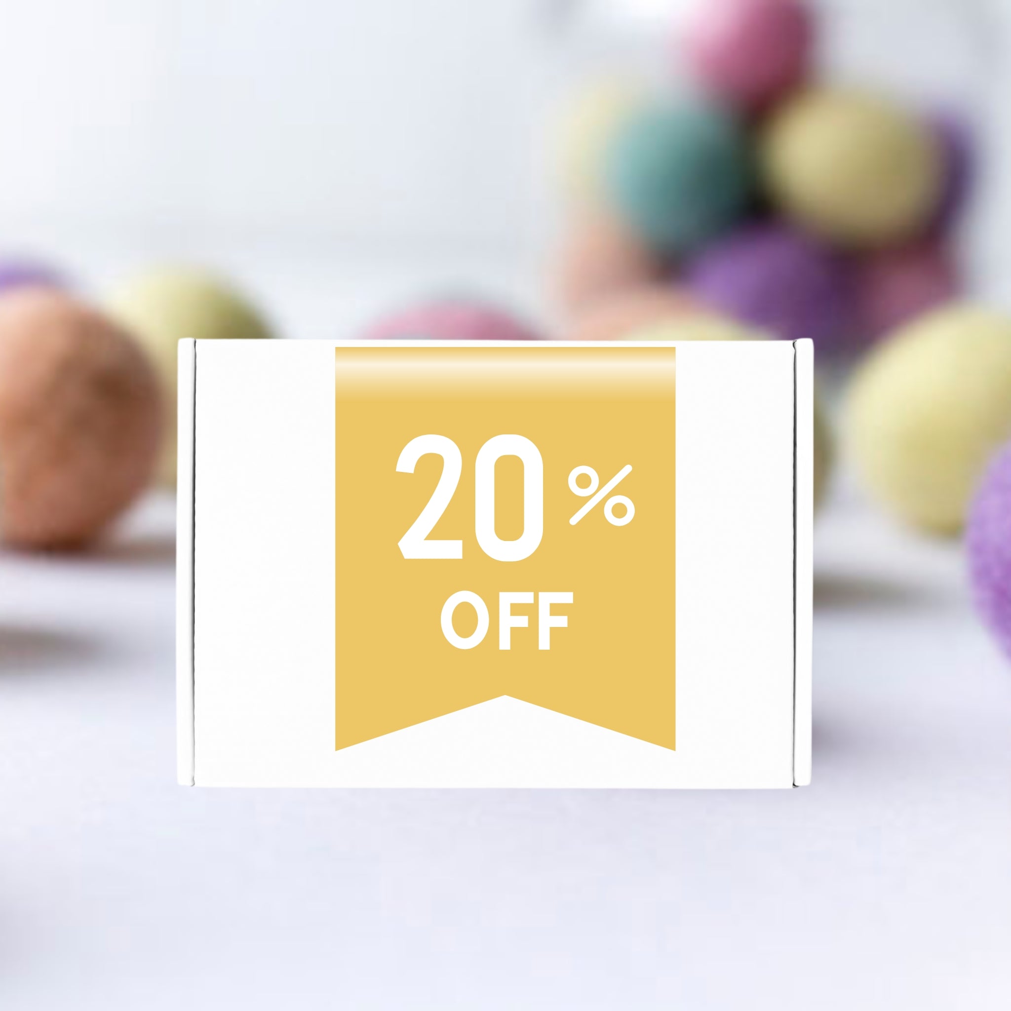 20% off discount banner with colorful felt balls in the background